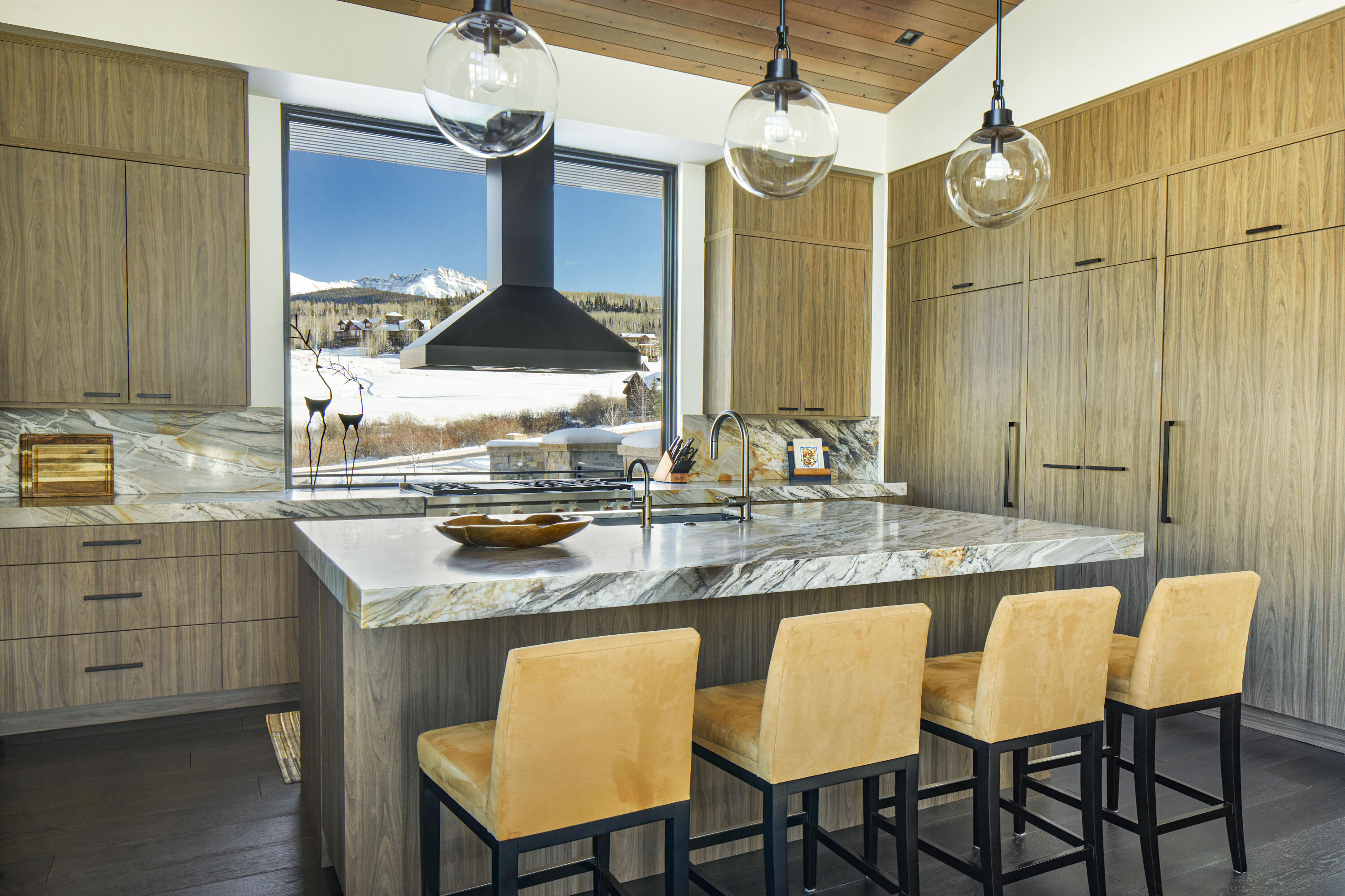 167 Adams Ranch Road Mountain Village, CO 81435 - Photo 5 of 28 a kitchen with a table and chairs in it