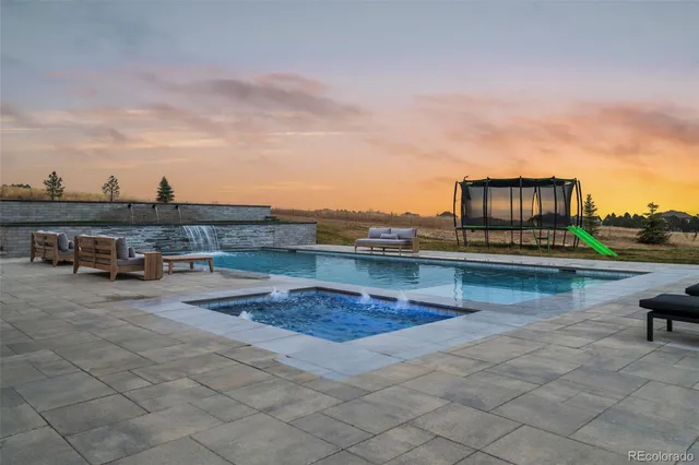 a view of a terrace with sitting area