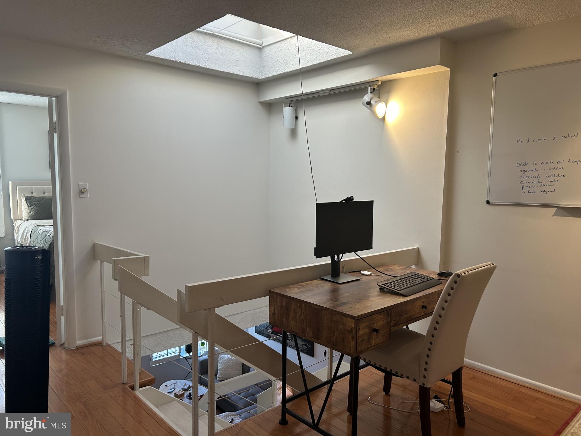 1800 R Street Northwest, Unit 808 Washington, DC 20009 - Photo 7 of 10 a view of a workspace with furniture