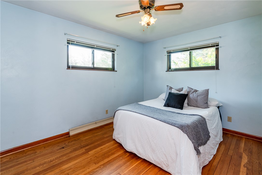 1176 Geneva Road Dayton, OH 45434 - Photo 17 of 55 This cozy room features durable hardwood floors and ample natural light from two windows.