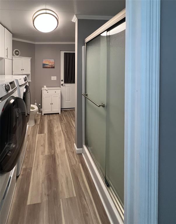 6501 Southeast 55th Lane, Unit 6501 Okeechobee, FL 34974 - Photo 7 of 15 a view of a room that has a bed and dresser in it