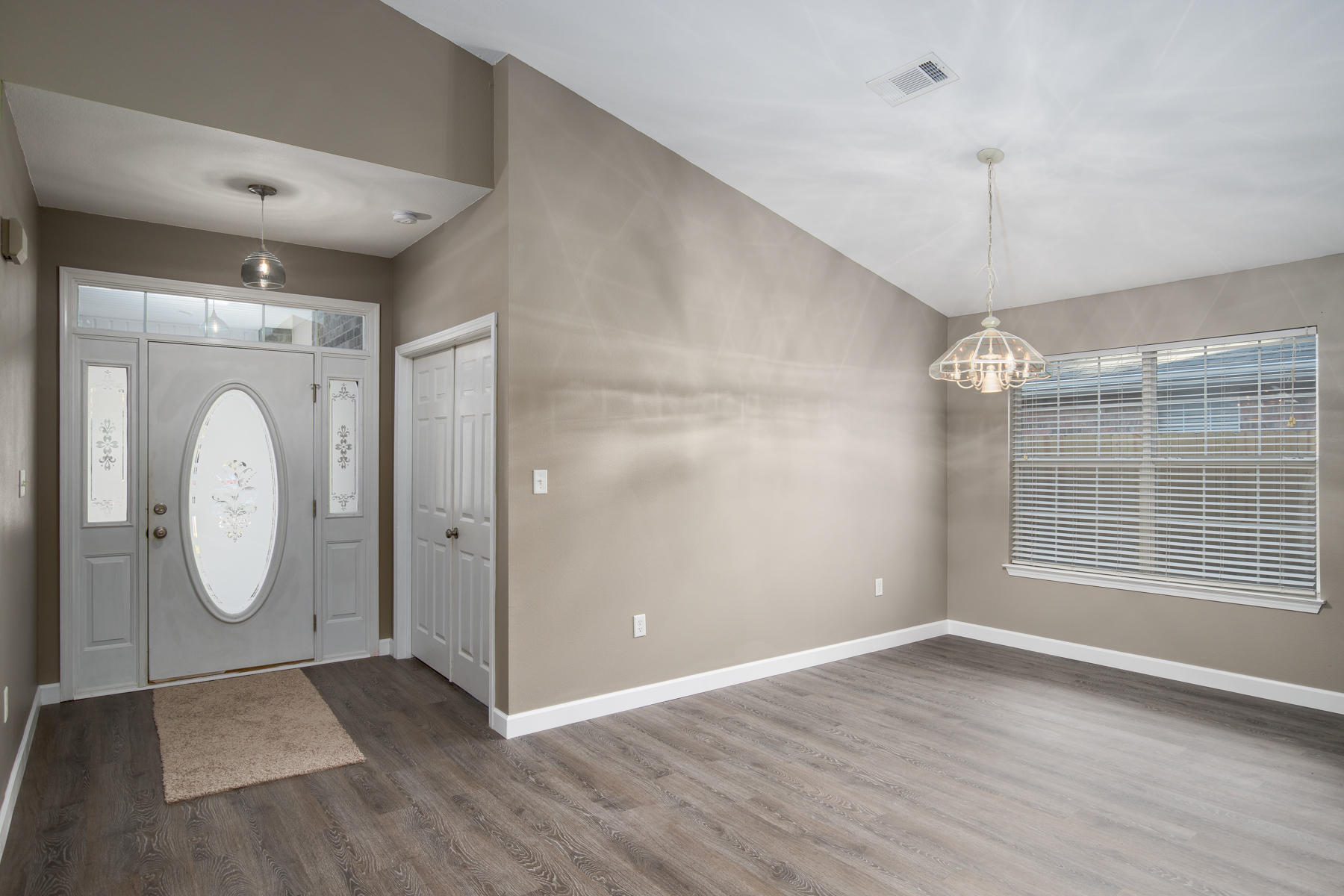 199 Bayou Landing Road Miramar Beach, FL 32550 - Photo 12 of 19 an empty room with wooden floor mirror and windows