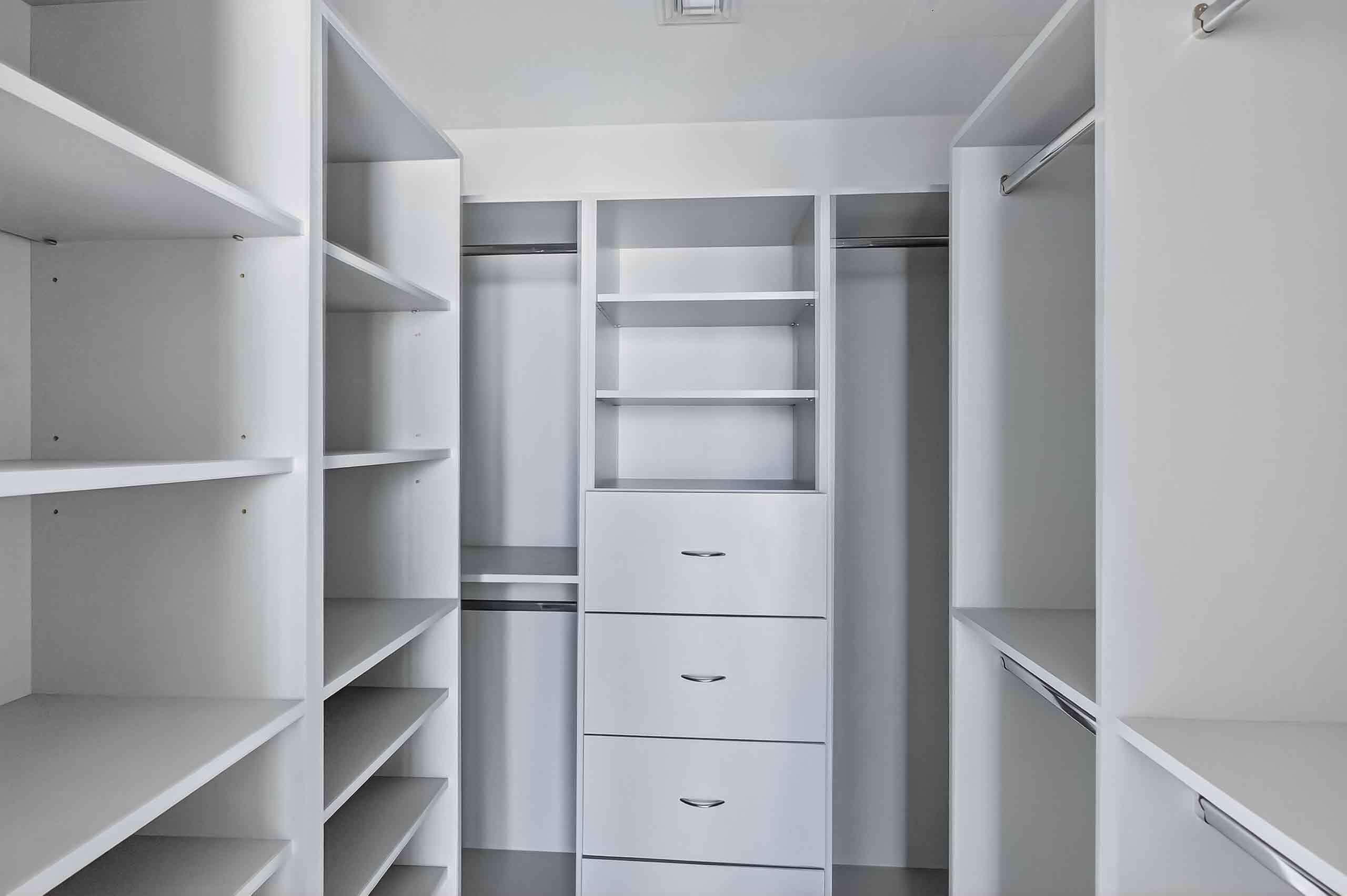 88 Southwest 7th Street, Unit 3003 Miami, FL 33130 - Photo 26 of 49 a view of walk in closet with empty racks