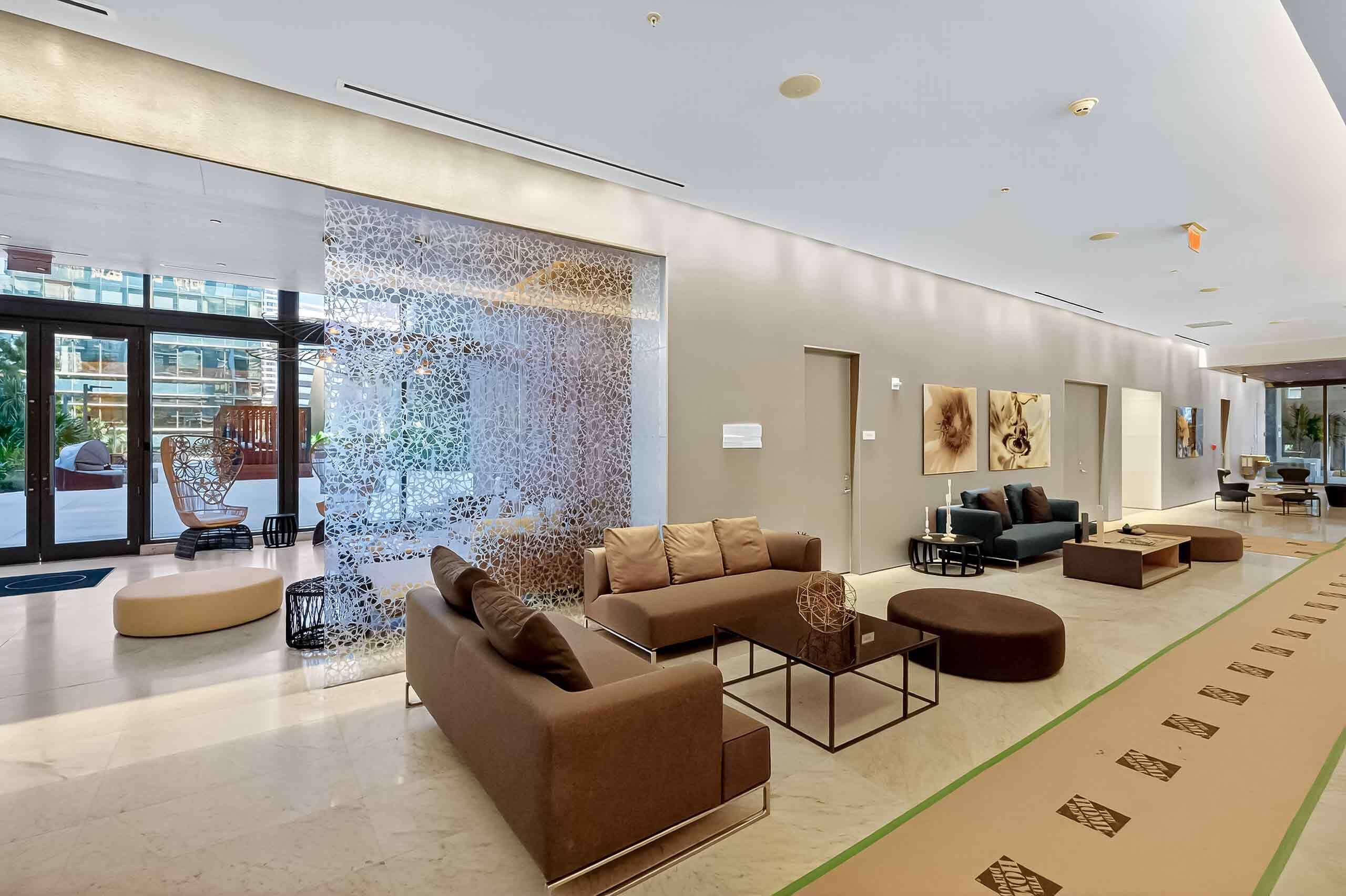 88 Southwest 7th Street, Unit 3003 Miami, FL 33130 - Photo 29 of 49 a living room with furniture and a large window