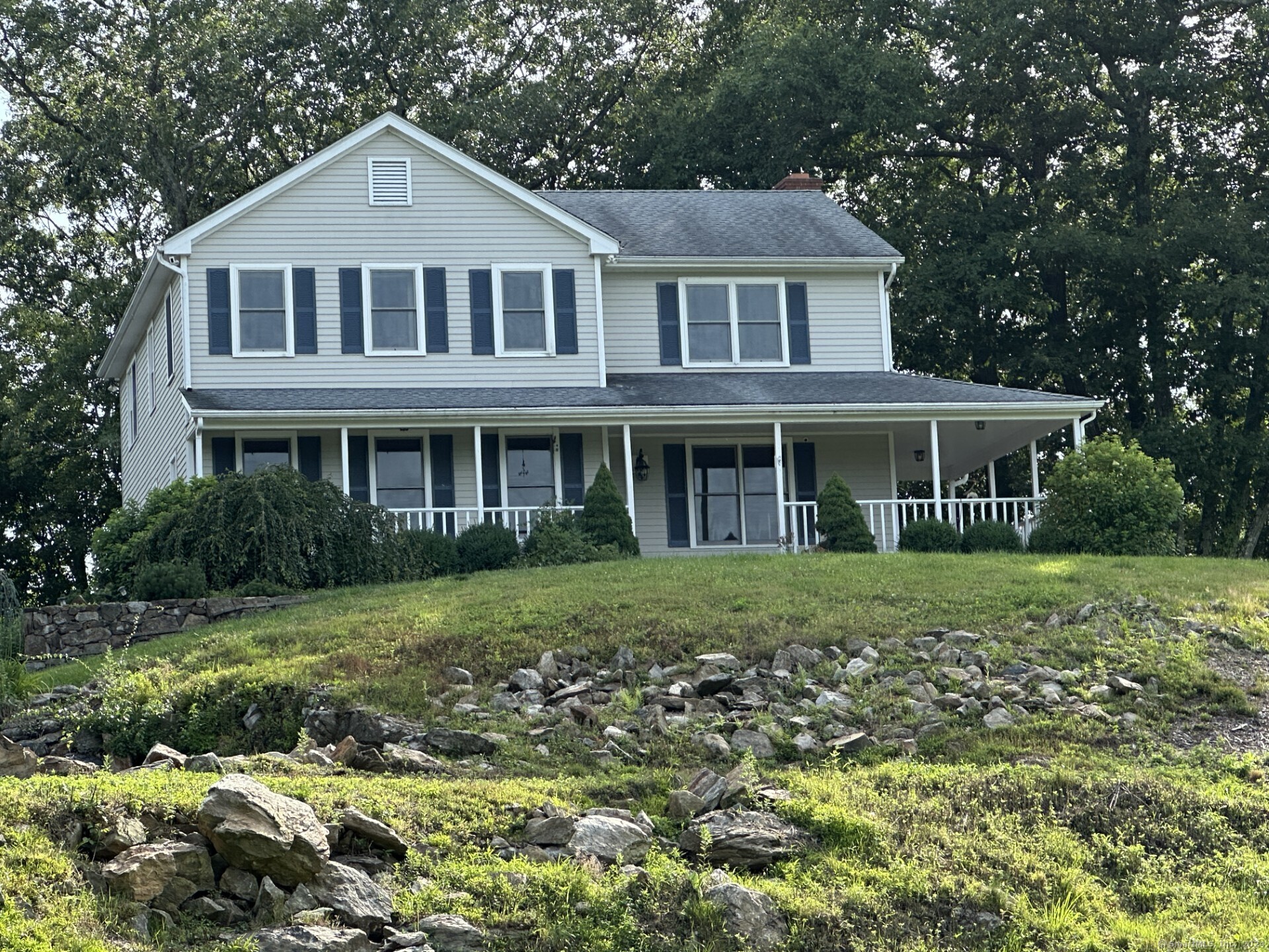 6 Patriot Ridge Road Newtown, CT 06482 - Photo 1 of 1 Front Photo mid- hill