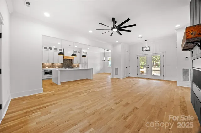 a view of a kitchen with furniture and window