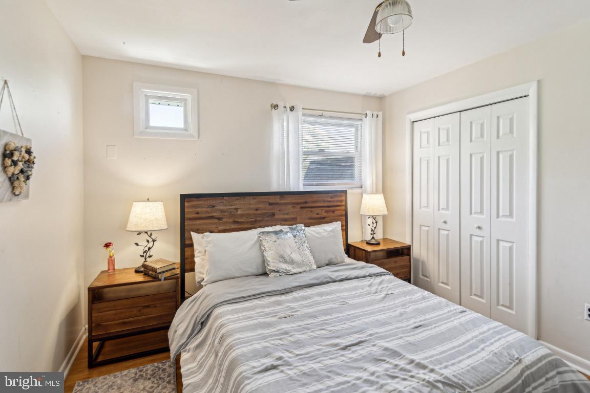 144 Elmtowne Boulevard Hammonton, NJ 08037 - Photo 16 of 25 a bedroom with a bed and a window