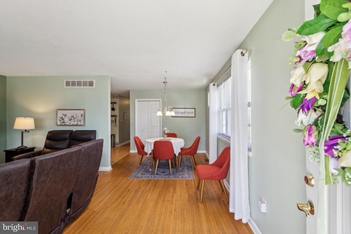 144 Elmtowne Boulevard Hammonton, NJ 08037 - Photo 3 of 25 a living room with furniture and wooden floor