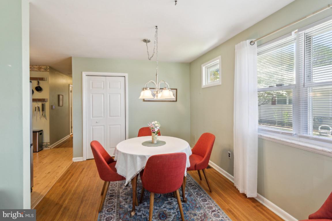 144 Elmtowne Boulevard Hammonton, NJ 08037 - Photo 7 of 25 a view of a dining room with furniture window and wooden floor