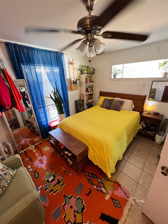 3318 Hemlock Avenue, Unit B Austin, TX 78722 - Photo 2 of 12 a bedroom with a bed and window
