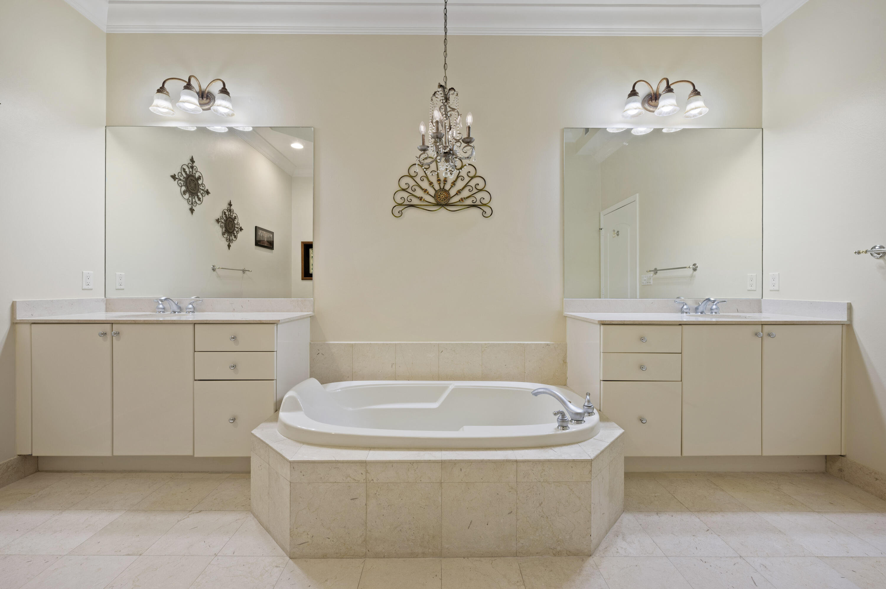 801 South Olive Avenue, Unit 416 West Palm Beach, FL 33401 - Photo 20 of 34 a bathroom with a tub sink and a mirror