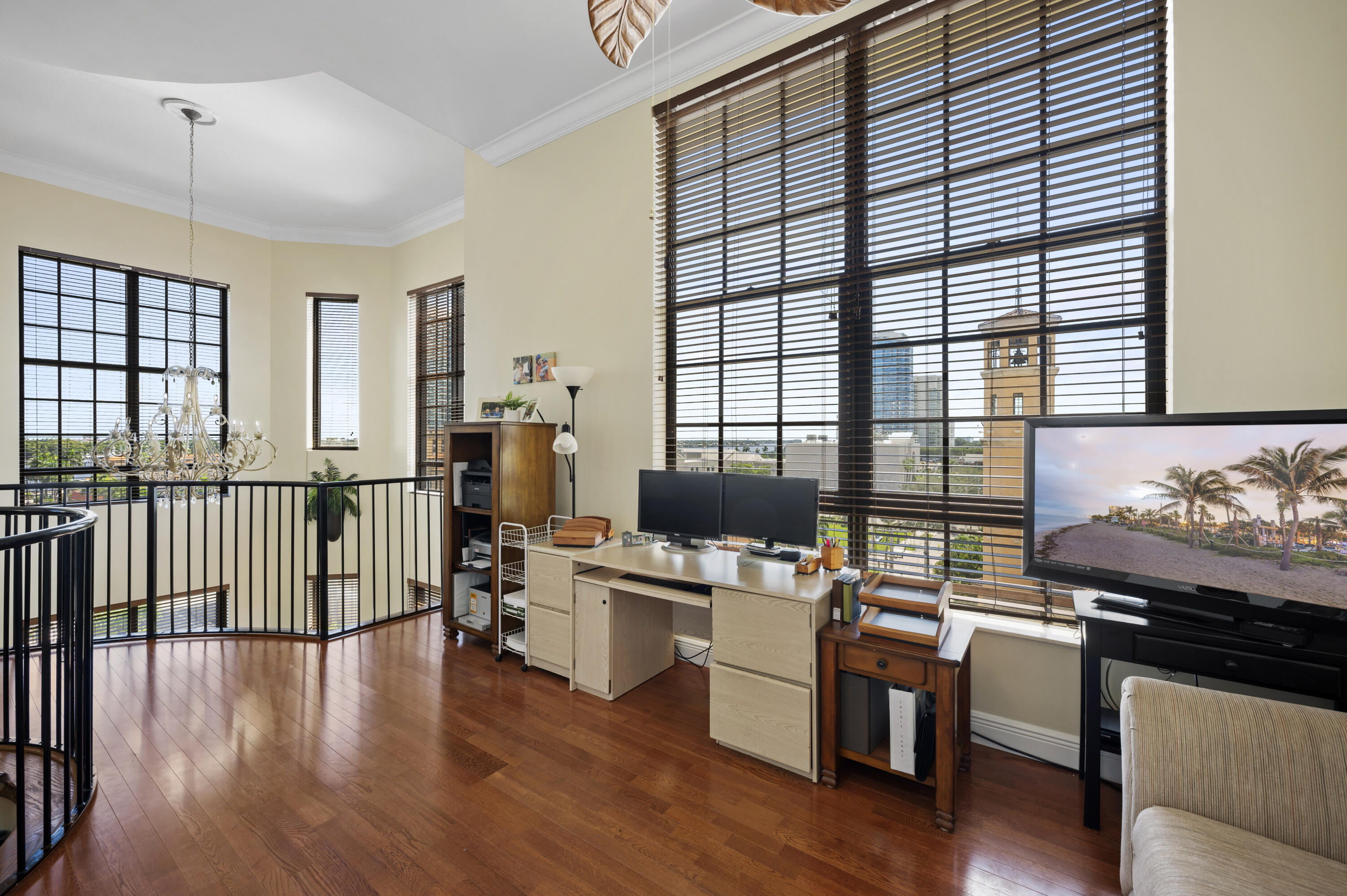 801 South Olive Avenue, Unit 416 West Palm Beach, FL 33401 - Photo 22 of 34 a workspace with wooden floor