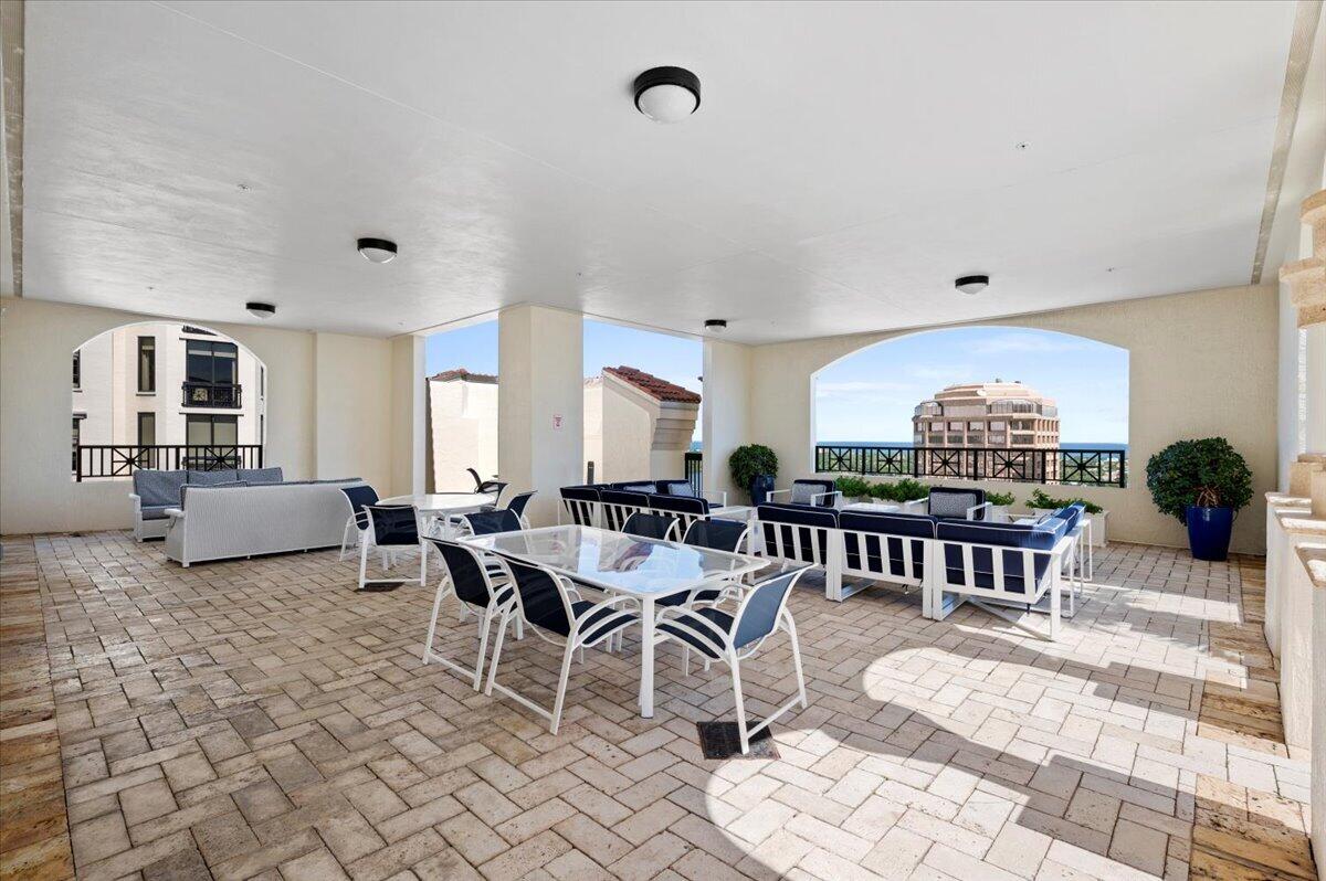 801 South Olive Avenue, Unit 416 West Palm Beach, FL 33401 - Photo 29 of 34 a view of a dining room with furniture