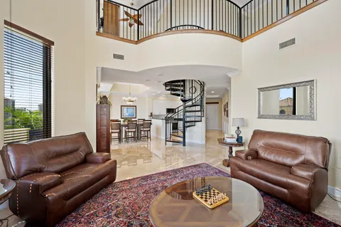 a living room with furniture or couch and a wooden floor