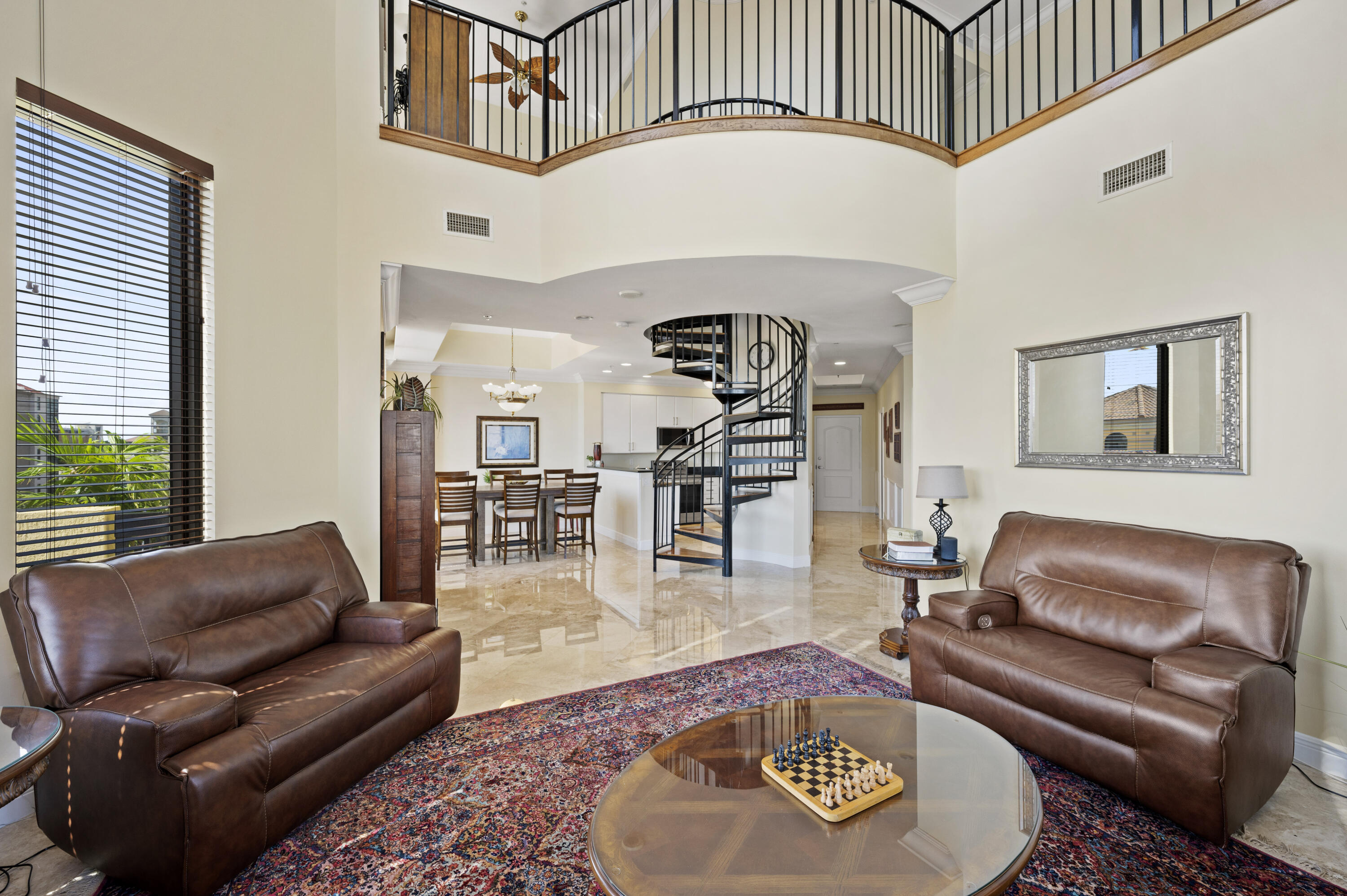 801 South Olive Avenue, Unit 416 West Palm Beach, FL 33401 - Photo 3 of 34 a living room with furniture or couch and a wooden floor