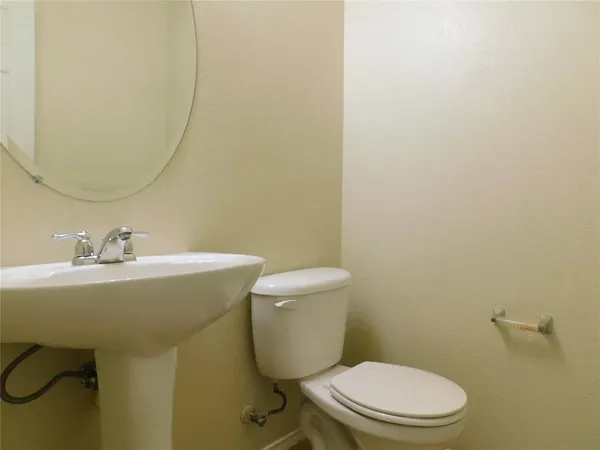 a bathroom with a sink and a toilet