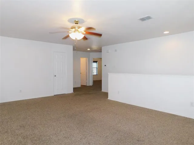 a view of a chandelier fan and a chandelier fan