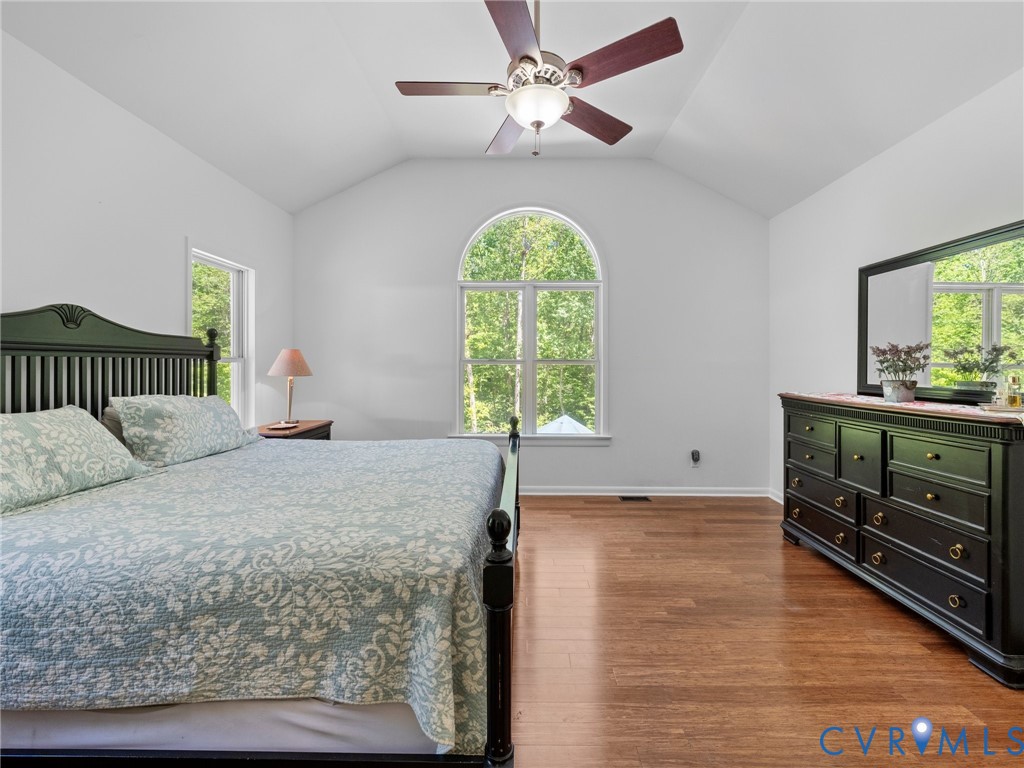 6126 Autumn Bluff Road Powhatan, VA 23139 - Photo 31 of 47 a bedroom with a bed and a window