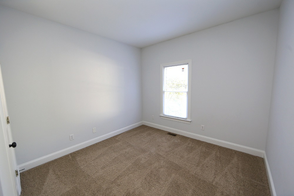 5012 Denham Court Raleigh, NC 27613 - Photo 8 of 13 Guest Bedroom