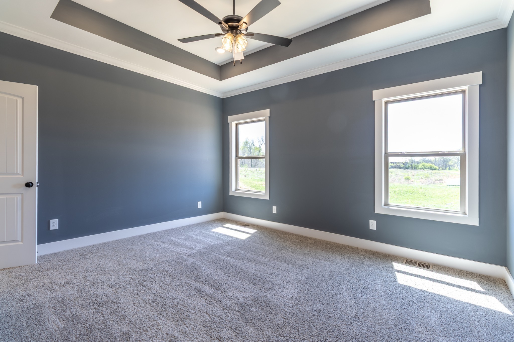 1161 Goose Drive Springfield, TN 37172 - Photo 13 of 19 an empty room with a window and a fan
