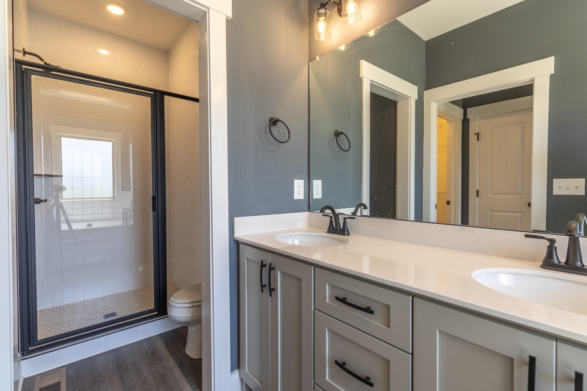 1161 Goose Drive Springfield, TN 37172 - Photo 16 of 19 a bathroom with a granite countertop sink mirror and double