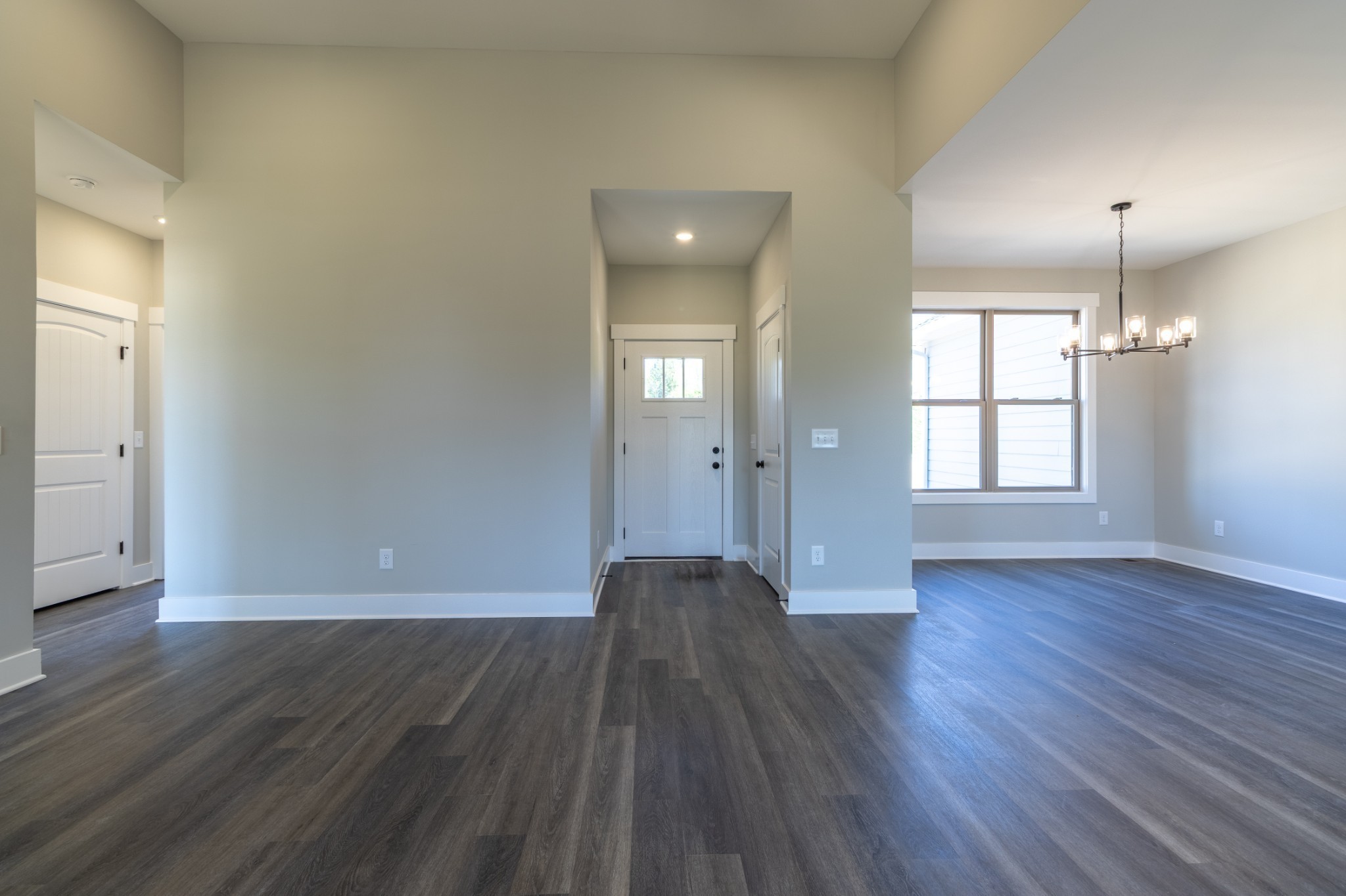 1161 Goose Drive Springfield, TN 37172 - Photo 10 of 19 an empty room with wooden floor and windows