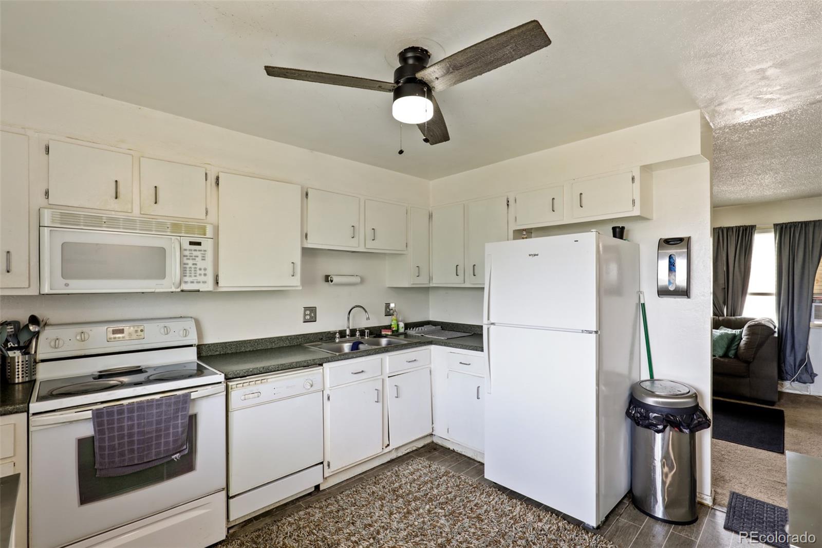 9457-9459 West 56th Place Arvada, CO 80002 - Photo 5 of 32