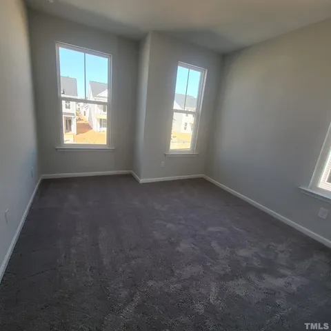 a bathroom with a toilet and a bathtub