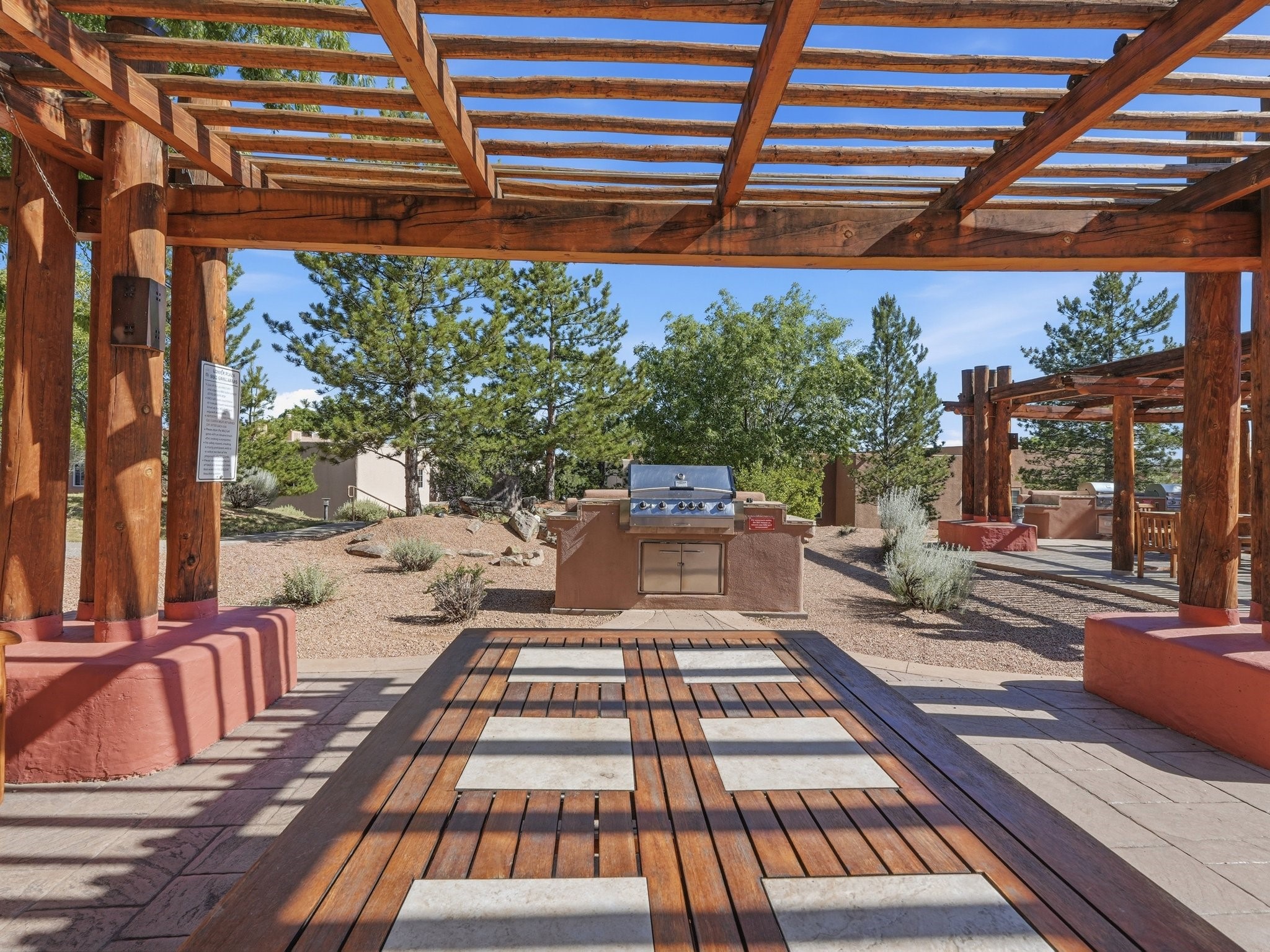 2210 Miguel Chavez Road, Unit 411 Santa Fe, NM 87505 - Photo 46 of 59 Nearby BBQ area within the community