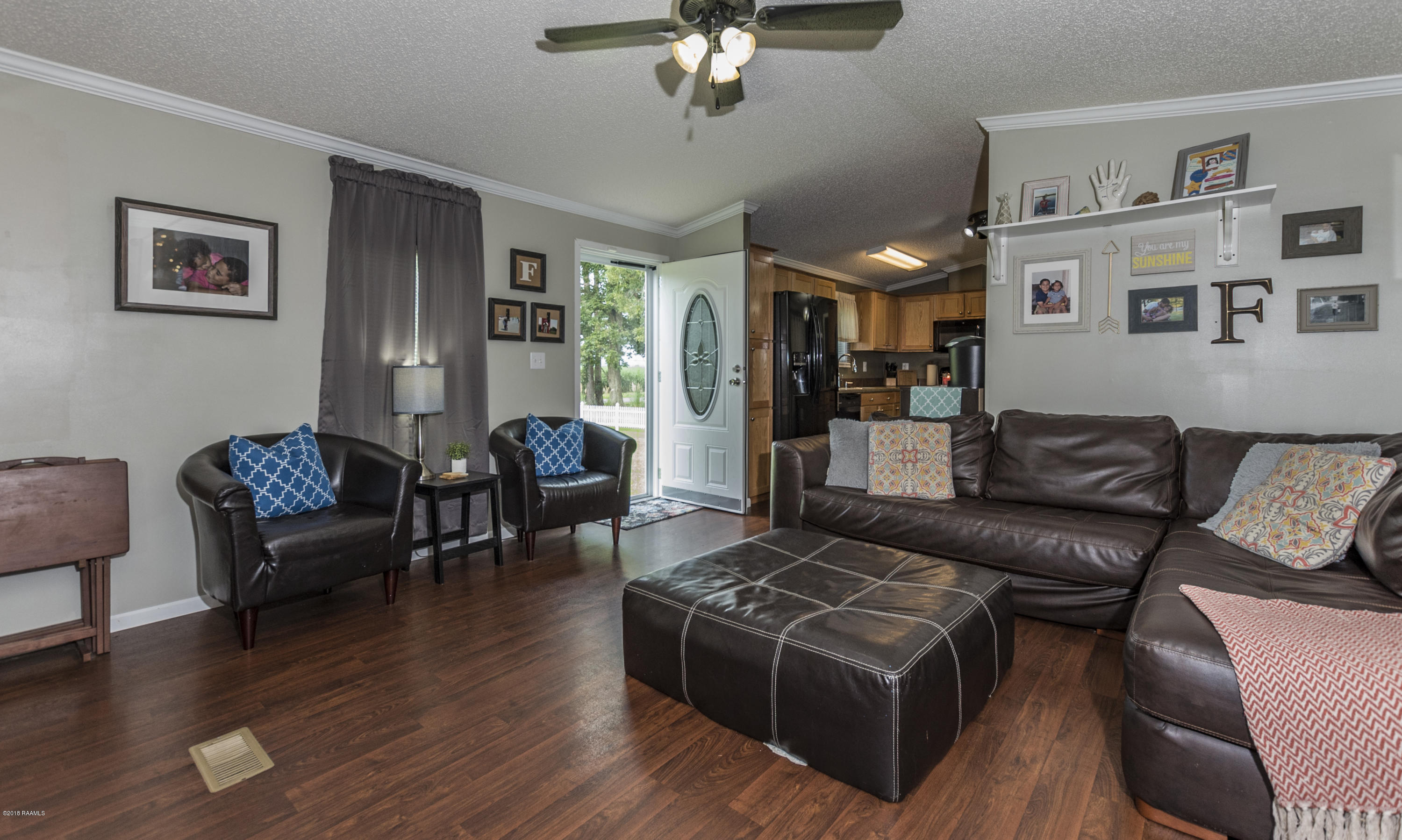 3418 Patoutville Road Jeanerette, LA 70544 - Photo 11 of 39 Living Room 1