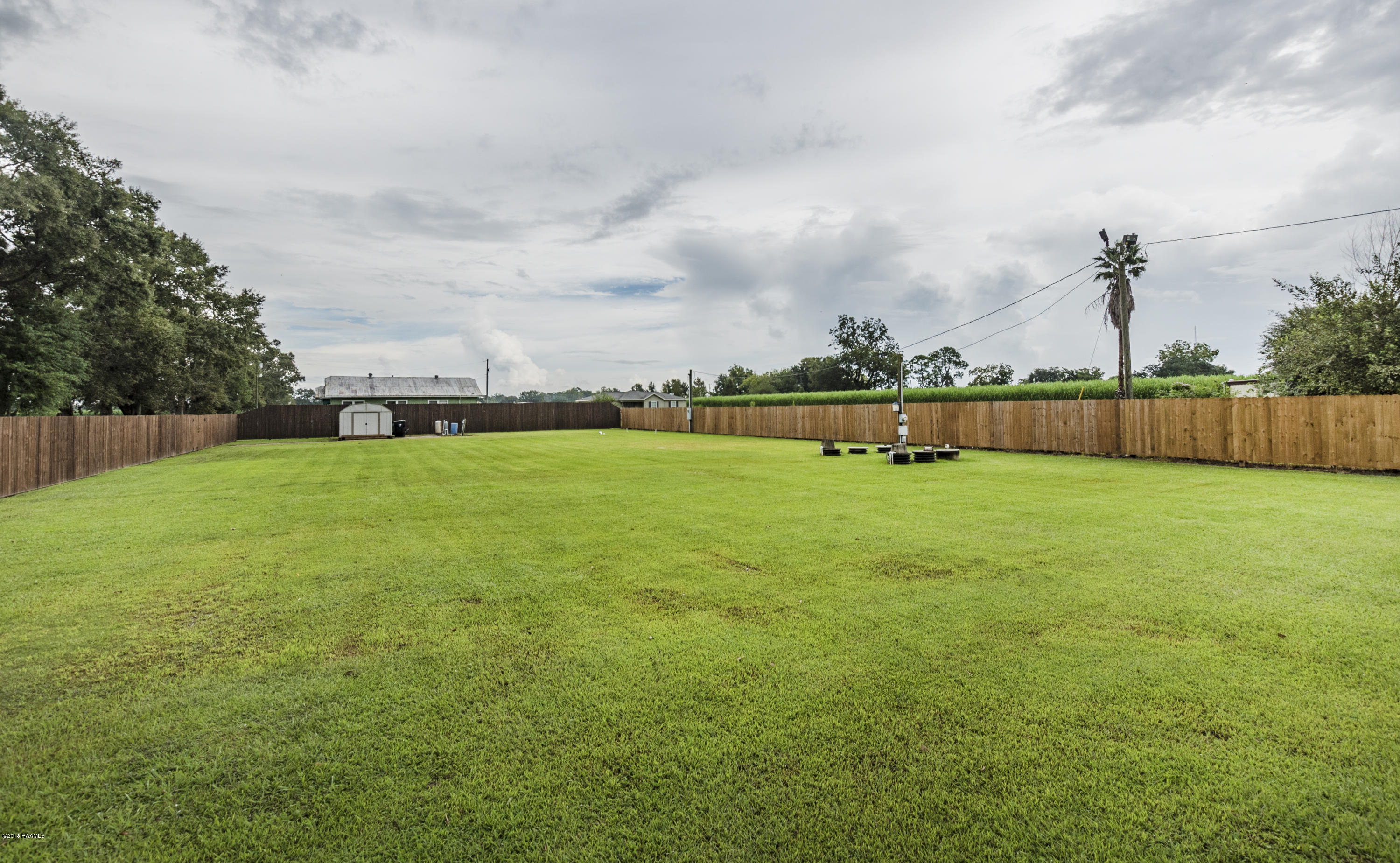 3418 Patoutville Road Jeanerette, LA 70544 - Photo 8 of 39 Back Yard 1