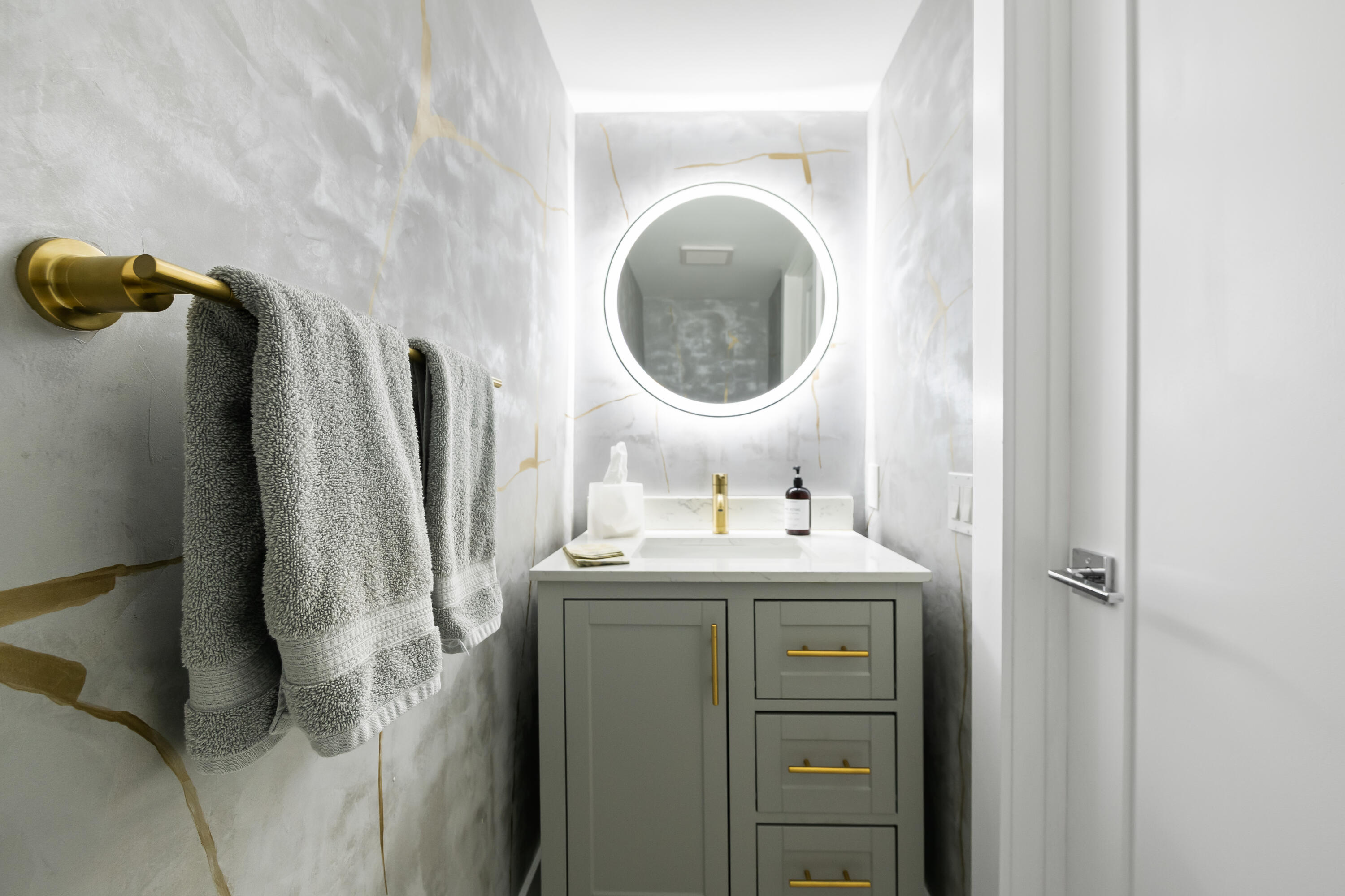 799 Jeffery Street, Unit 303 Boca Raton, FL 33487 - Photo 11 of 42 a bathroom with a sink vanity and a mirror