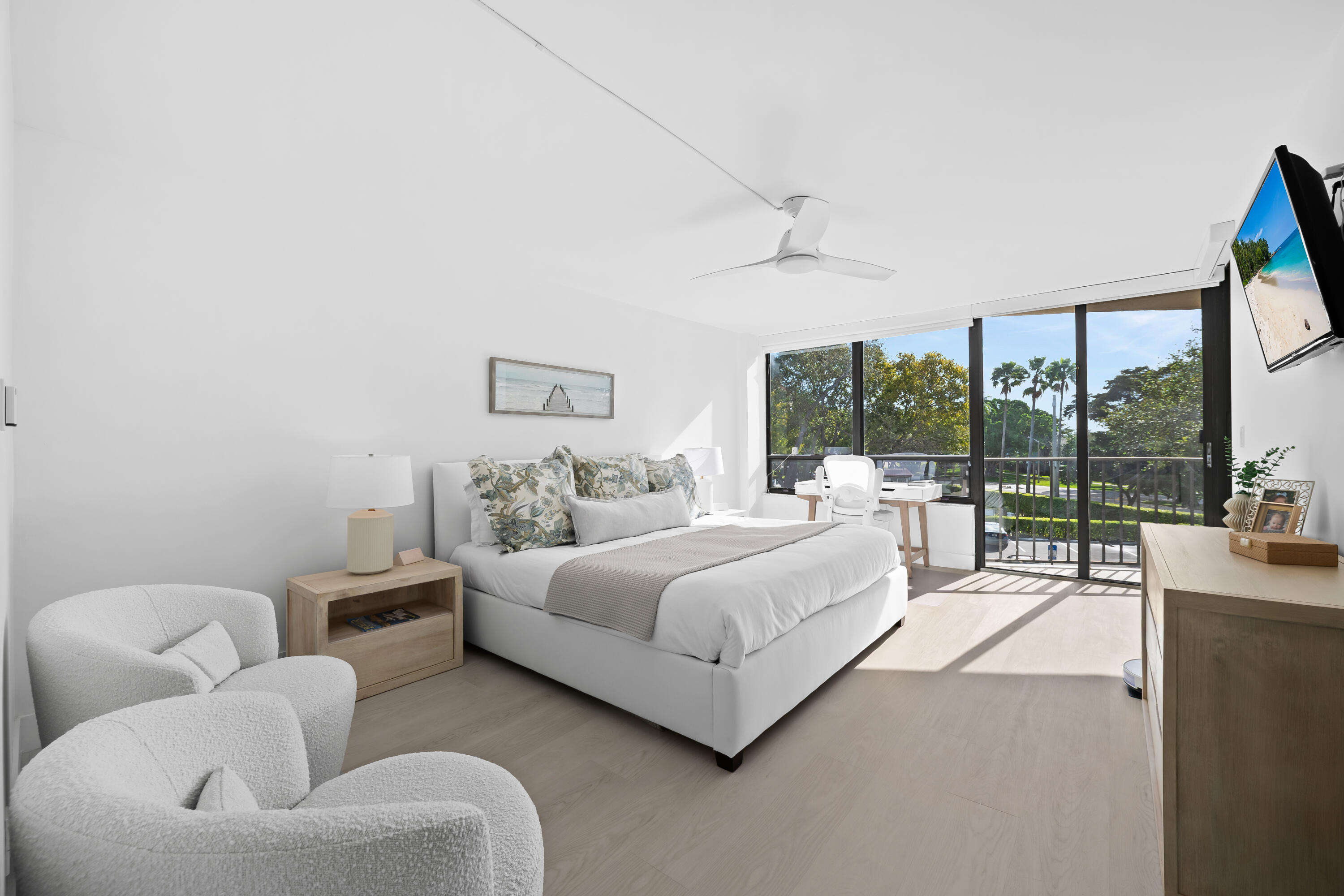 799 Jeffery Street, Unit 303 Boca Raton, FL 33487 - Photo 15 of 42 a bedroom with furniture and a large window