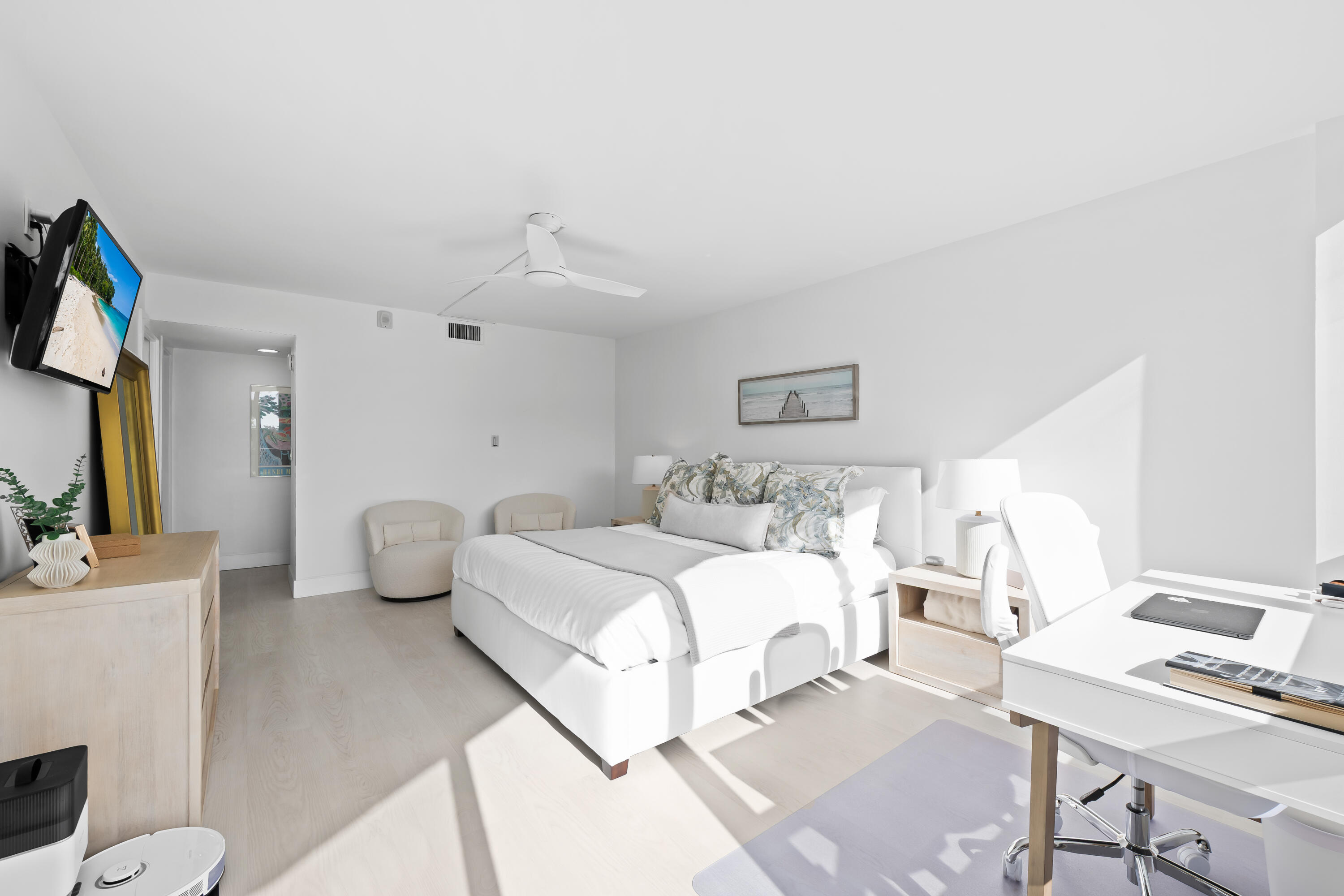 799 Jeffery Street, Unit 303 Boca Raton, FL 33487 - Photo 17 of 42 a bedroom with a bed and a flat screen tv