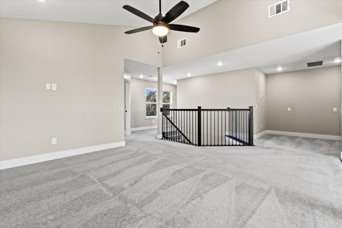 17503 Panorama Drive Dripping Springs, TX 78620 - Photo 17 of 26 an entryway with a ceiling fan and a projector