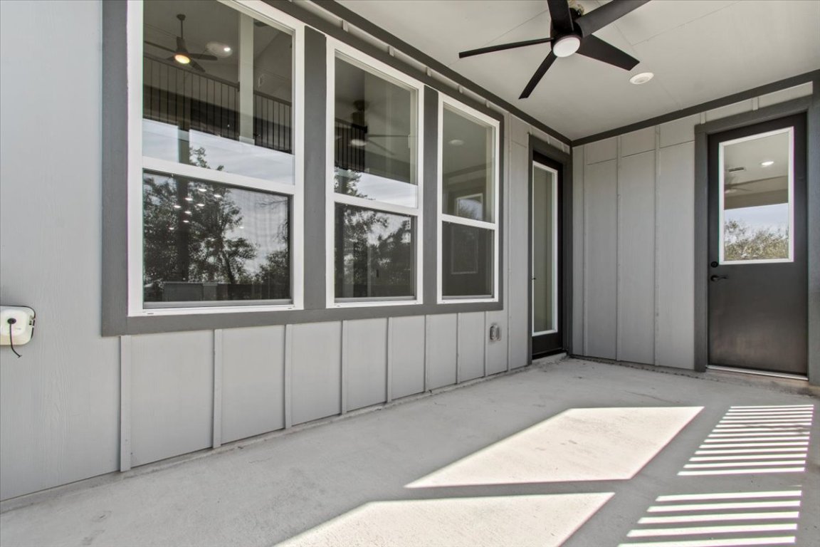 17503 Panorama Drive Dripping Springs, TX 78620 - Photo 22 of 26 a view of an entryway with a glass door