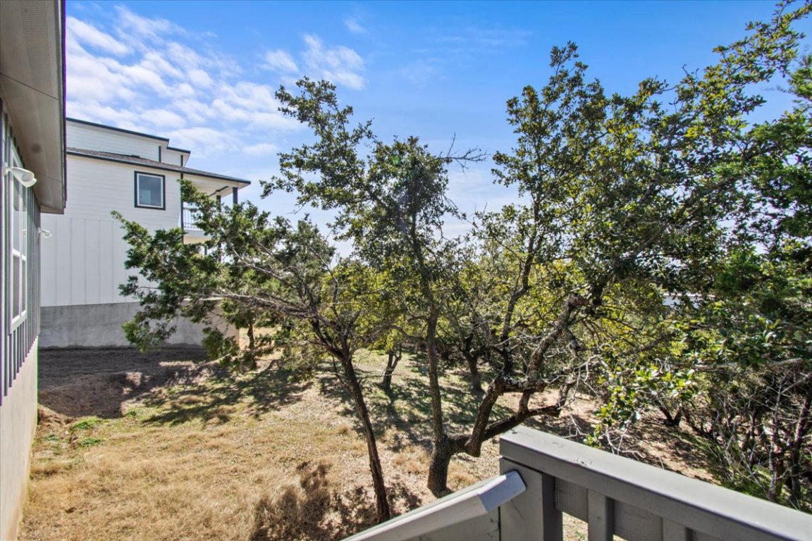 17503 Panorama Drive Dripping Springs, TX 78620 - Photo 25 of 26 a view of a tree with wooden fence