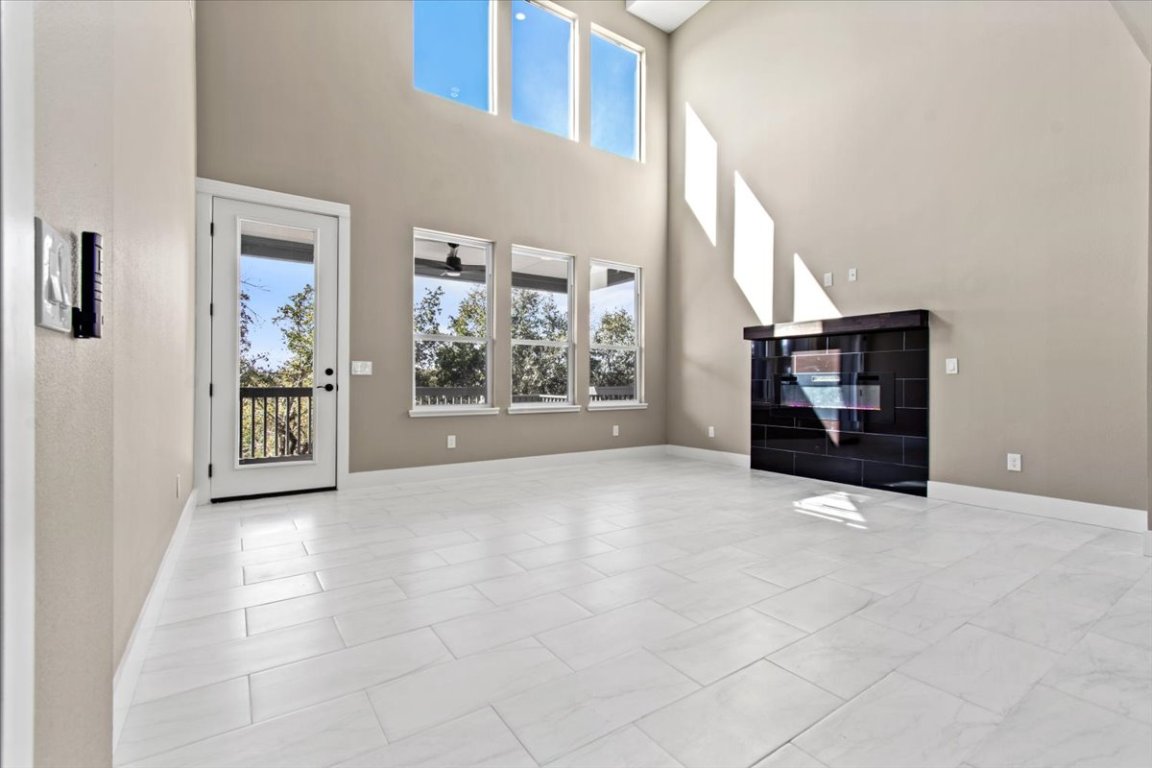 17503 Panorama Drive Dripping Springs, TX 78620 - Photo 9 of 26 a view of an empty room with a window