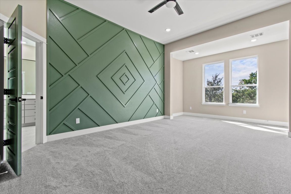 17503 Panorama Drive Dripping Springs, TX 78620 - Photo 10 of 26 a view of a room with a window and a ceiling fan