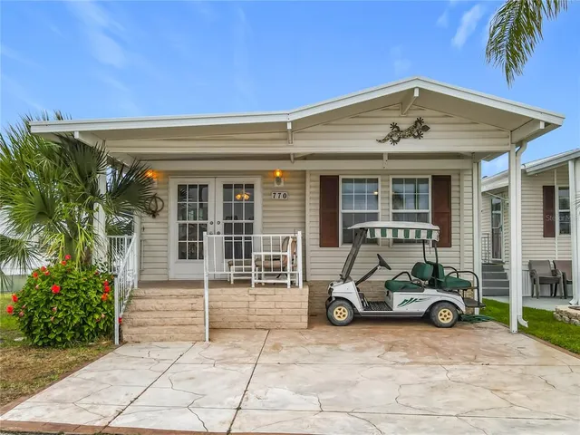 a blue house with outdoor space