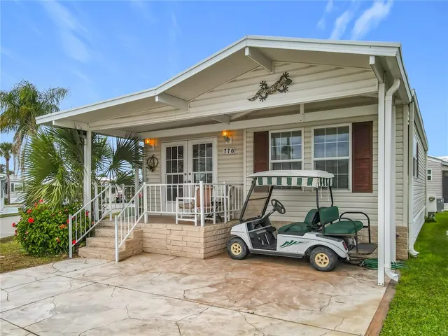 a view of a car in front of a house
