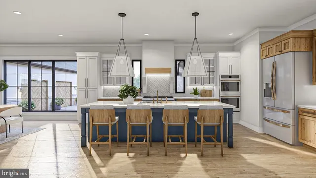 a large kitchen with a table and chairs