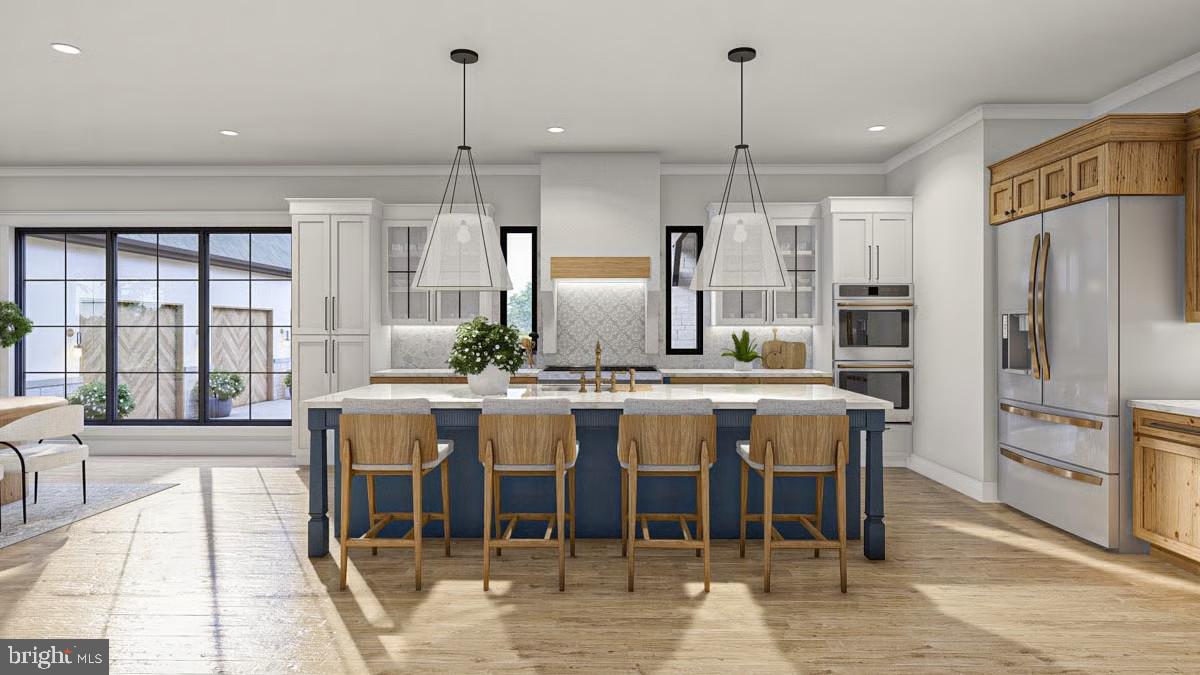 3150 Bidle Road Middletown, MD 21769 - Photo 17 of 27 a large kitchen with a table and chairs