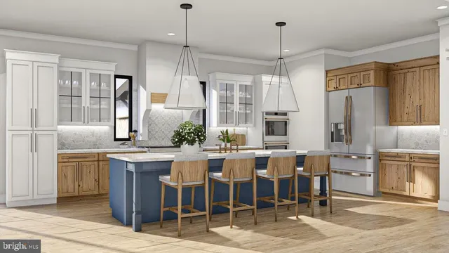 a large kitchen with a table and chairs