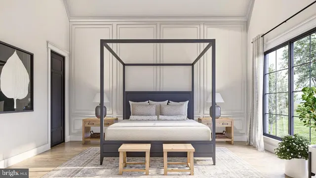 a bedroom with a bed a mirror and a potted plant