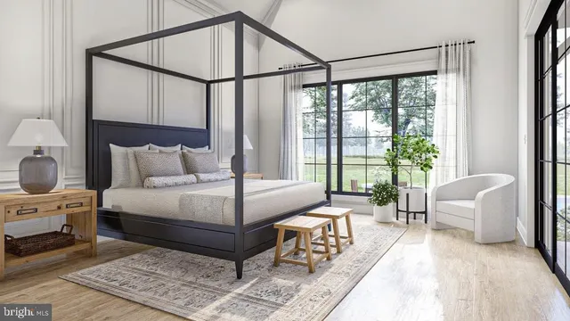 a bedroom with a bed a lamp and a large window