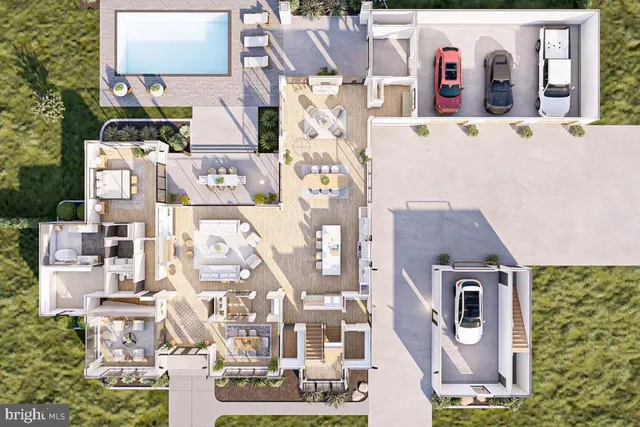 an aerial view of residential houses with outdoor space and parking