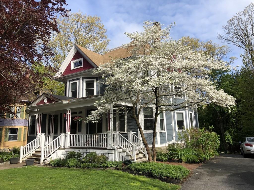 87 Hillside Road Newton, MA 02461 - Photo 22 of 30 a front view of a house with a yard