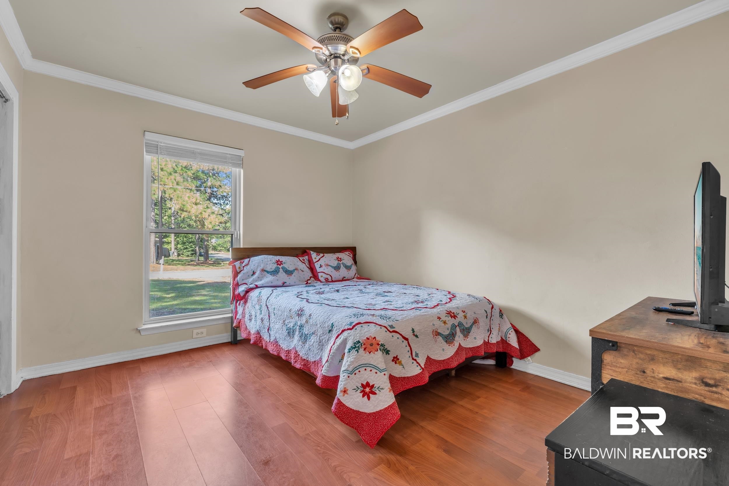 130 Chatam Loop Daphne, AL 36526 - Photo 19 of 26 Bedroom featuring ornamental molding, wood finished floors, and ceiling fan