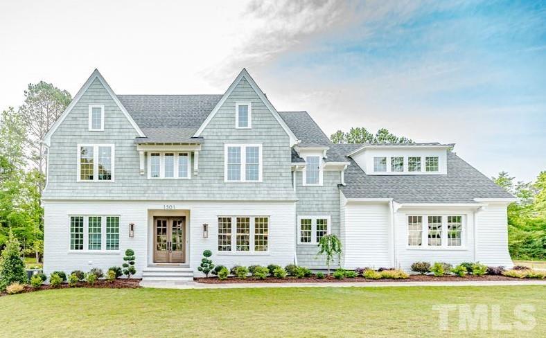 1501 Kirkby Lane Raleigh, NC 27614 - Photo 2 of 54 a front view of a house with swimming pool and porch